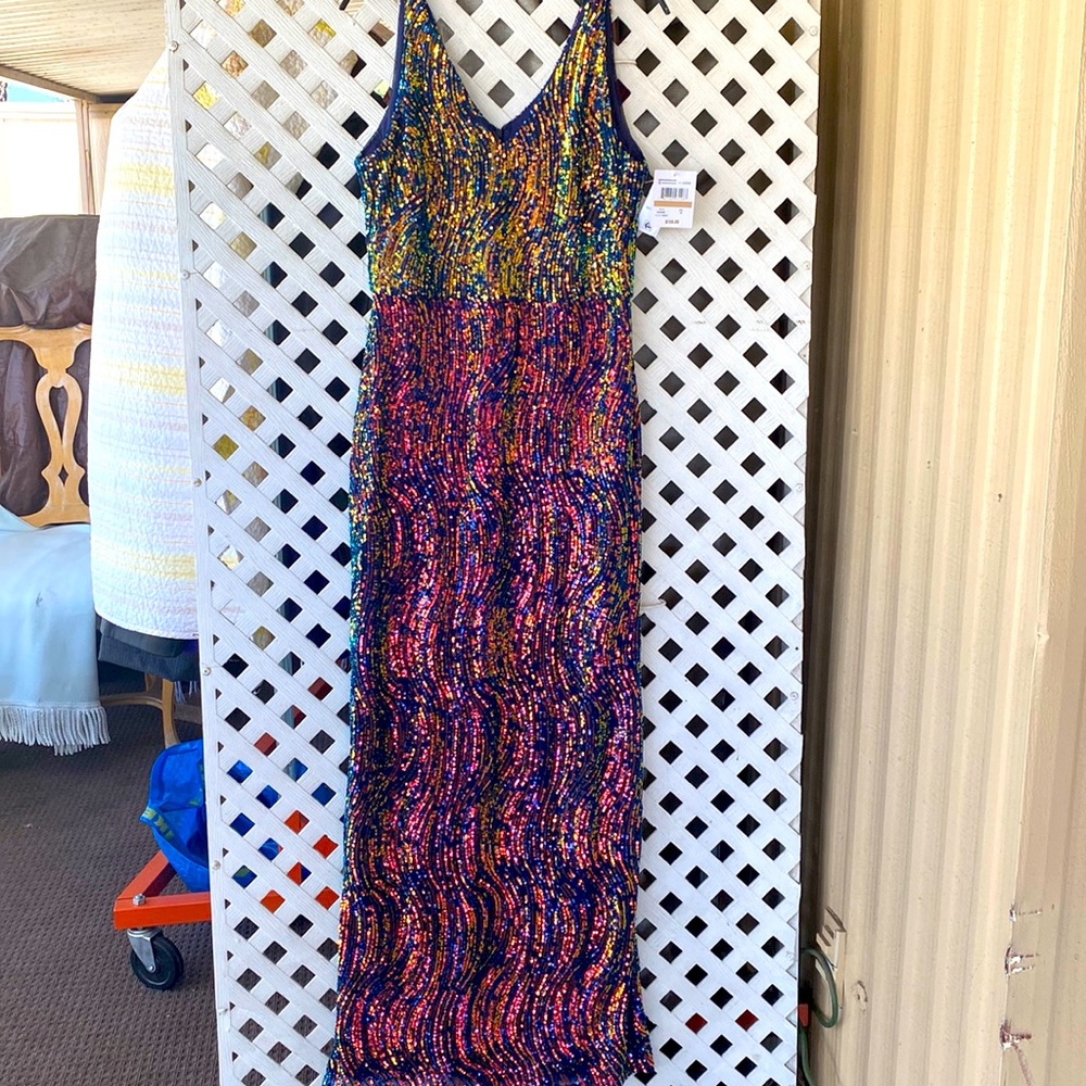 Very luxurious long gold and blue sequined dress. Size 12. R &M brand.